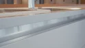 tracking-shot-of-a-cabinet-in-a-luxury-kitchen-SBI-351041782